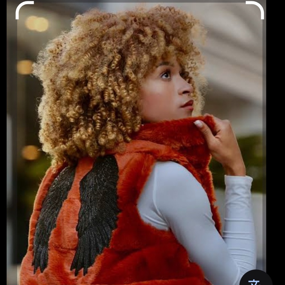 Bold Orange Faux Fur Vest with Black Wing Design